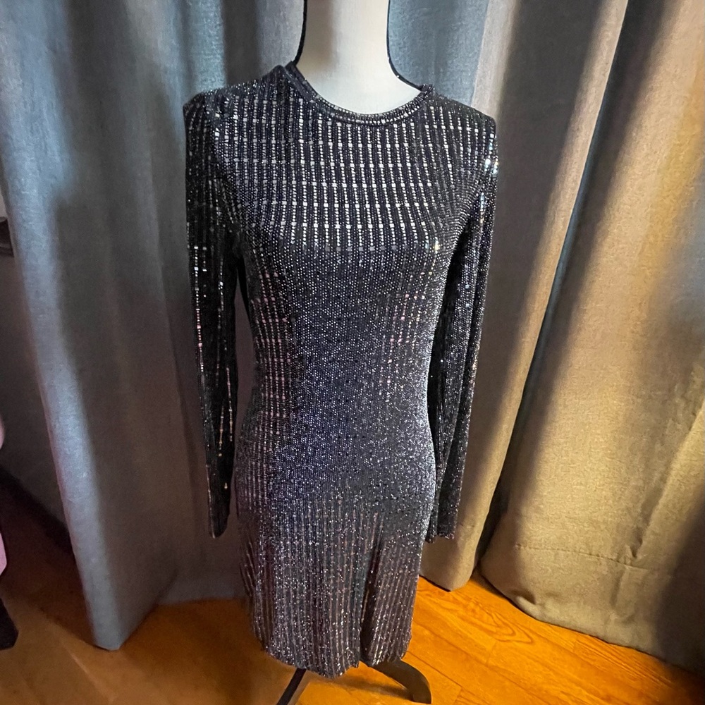 Party dress for a night on the town. Made with spandex and sequins!